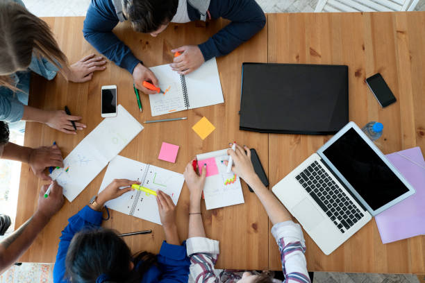 istock Young business team working together at office 1191661052