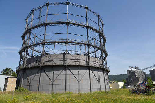 The Gasometer of Schlieren was a former natural gas tank / container. There have been four tanks, only one was preserved. The tanks had a capacitivity of 25.000–100.000 m³. The image was captured during summer season.