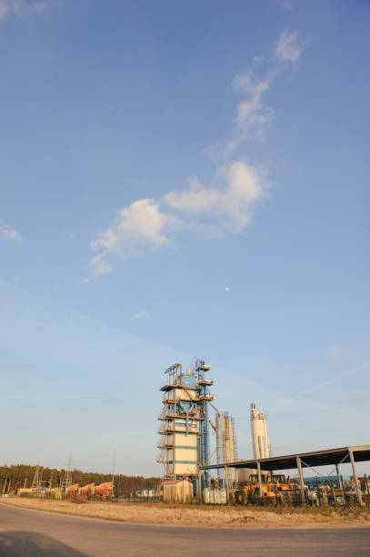 istock Modern industrial building over blue sky 1191662692