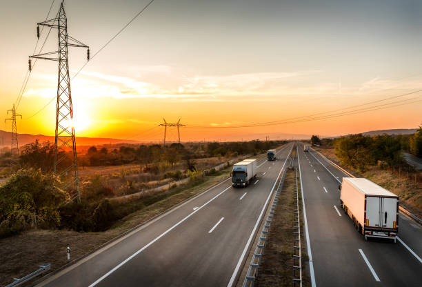 istock Lorry trucks passing each other on a highway 1191665552