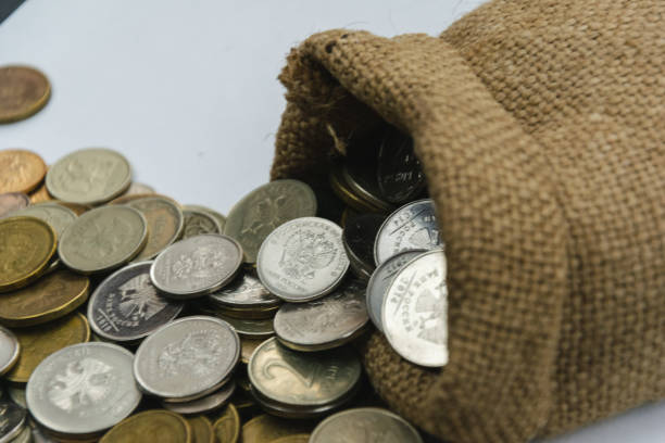 istock sack bag with coins on the white background 1191667919