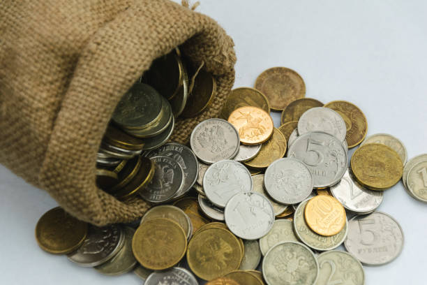 istock sack bag with coins on the white background 1191667924