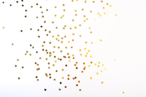 Estrellas doradas sobre fondo blanco photo