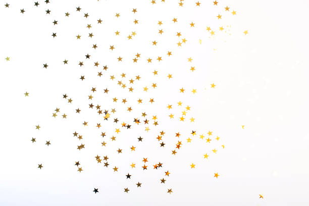 Golden stars on white background Golden stars on white background. Flat lay, top view. celebrities stock pictures, royalty-free photos & images