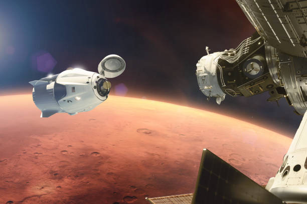 istock Cargo spacecraft in low-Mars orbit. Elements of this image furnished by NASA. 1191672099