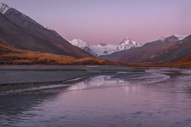 istock mountains dawn river glacier snow autumn reflection 1191673364