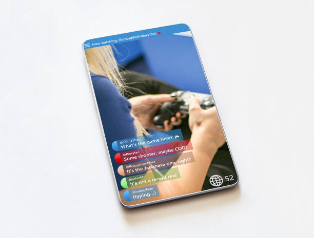 istock Watching a generic video game streamer on a modern borderless smart phone 1191674780