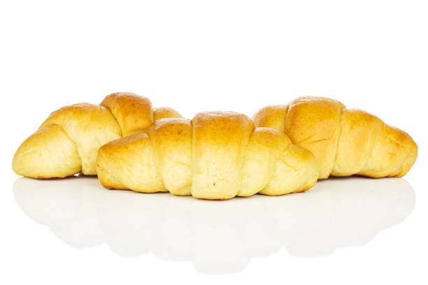istock Sweet mini croissant isolated on white 1191674891