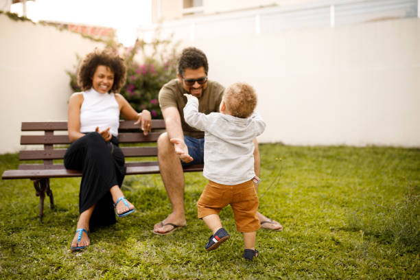 istock Baby walking towards his parents 1191676566