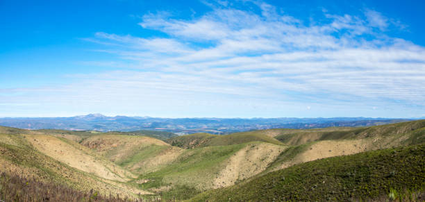 istock Green valley and distant mountains in Southern Cape 1191676656