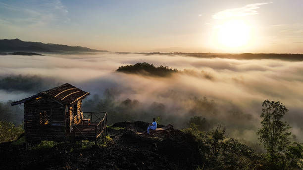 Mount Ireng East view from Gunung Ireng at dawn, Gunung Ireng (Black mountain) is a hill located on Yogyakarta, Indonesia yogyakarta stock pictures, royalty-free photos & images