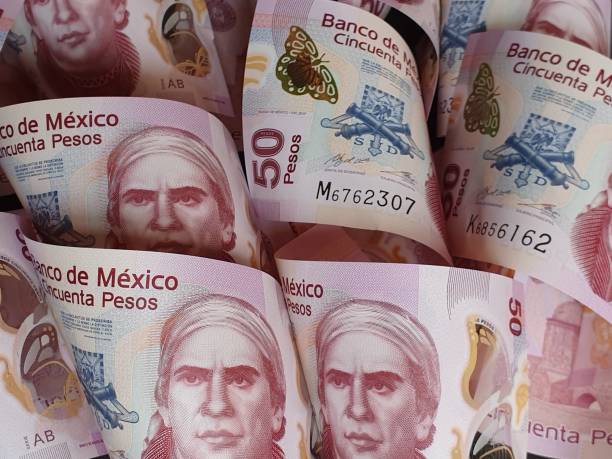 Mexican banknotes of fifty pesos background for business, economy and finance issues mexican currency stock pictures, royalty-free photos & images