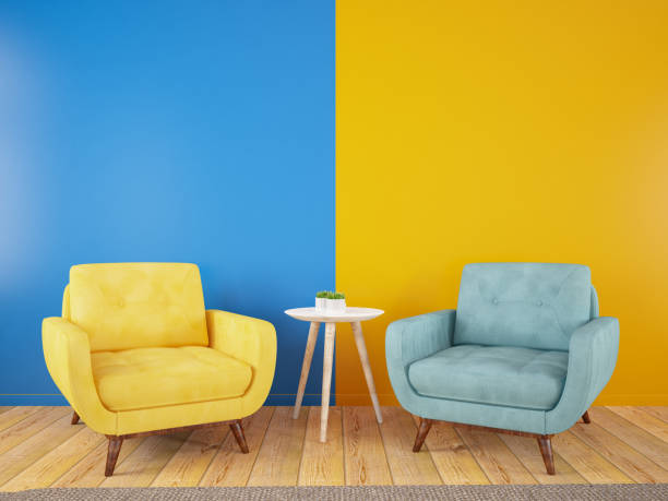 armchairs divided in half into two parts in the middle. yellow blue modern and colorful cozy concept - empty seat imagens e fotografias de stock