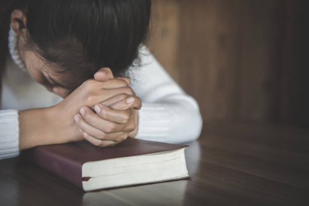 istock Praying Hands. Eucharist Therapy Bless God Helping Repent Catholic Easter Lent Mind Pray. Christian Religion concept background. 1191683215