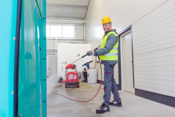 istock Worker cleaning a rental or mobile toilet 1191684964