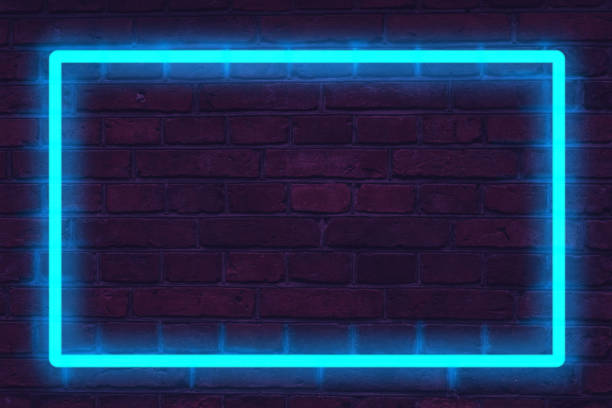 istock blue neon light on a brick wall at night 1191685590