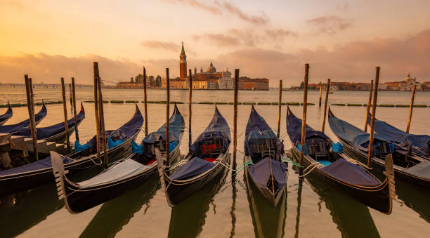 istock gondolas moored at sunset, Venice, Italy 1191686857