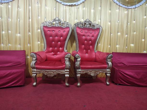 istock Traditional Indian wedding ceremony bride and groom chairs 1191687966
