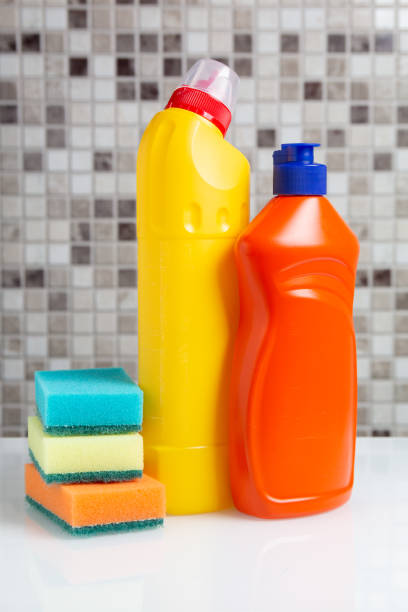 istock plastic bottle with cleaning agent and sponges on the table 1191688575