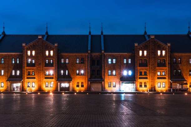 istock Twilight of a red brick warehouse 1191690039