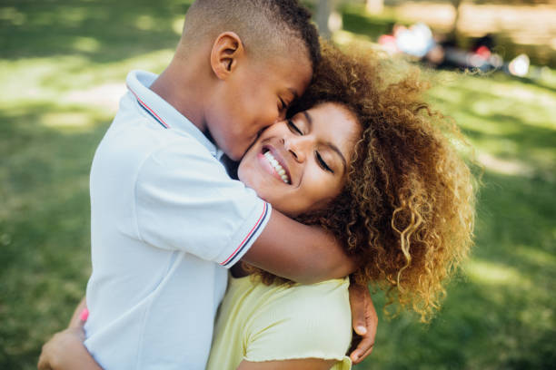 istock Boy kissing his mom 1191690654