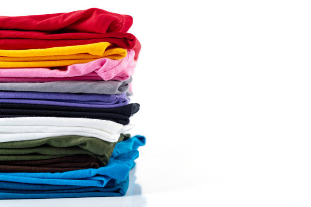 istock Stack of Colorful cotton T-shirt isolated on white background. 1191690750
