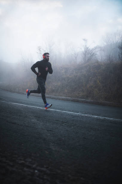 Man Running On The Road.