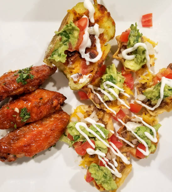 istock Wings and potato skins 1191694262