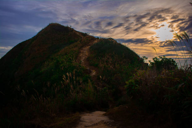 istock Climbing up the hill during sunset 1191694402