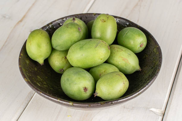istock Hardy green kiwi on grey wood 1191697253