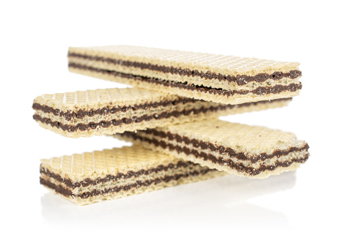 Group of four whole sweet chocolate biscuit wafer isolated on white background