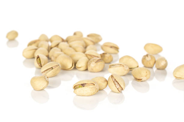 istock Salted pistachio isolated on white 1191701977