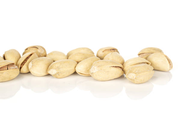 istock Salted pistachio isolated on white 1191702063