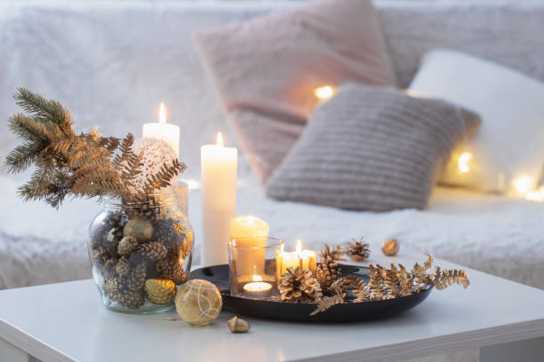 istock Christmas decoration   with burning candles on  white table agai 1191704215