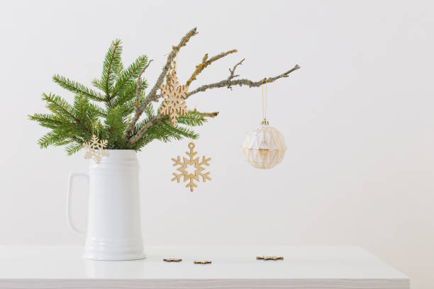 istock modern Christmas sill life in jug on white background 1191704390
