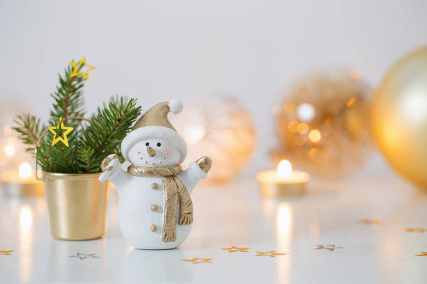 istock Christmas decorations with little ceramic snowman 1191704440