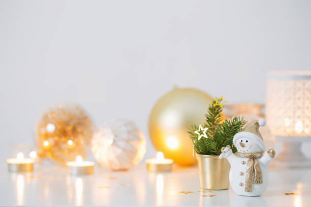 istock Christmas decorations with little ceramic snowman 1191704444