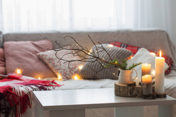 istock Composition of candles on  white table against the background of 1191707162