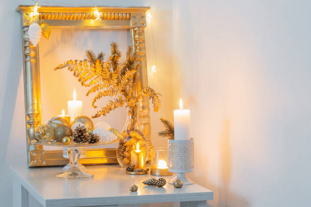 istock Christmas golden decor in white interior 1191707205