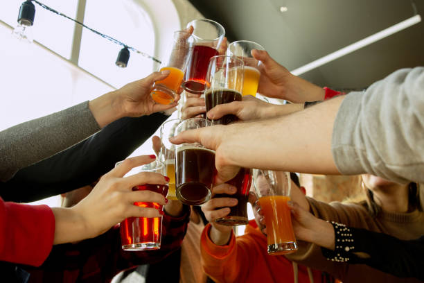 istock Happy co-workers celebrating while company party and corporate event 1191707938