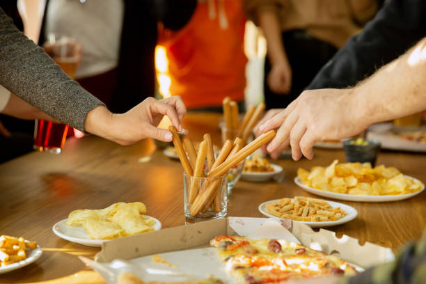 istock Happy co-workers celebrating while company party and corporate event 1191707943