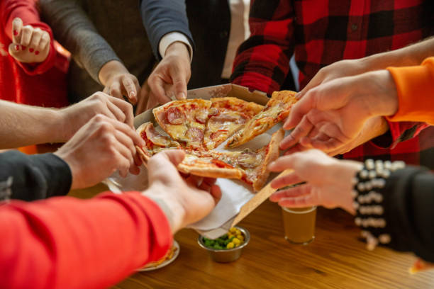 istock Happy co-workers celebrating while company party and corporate event 1191707964