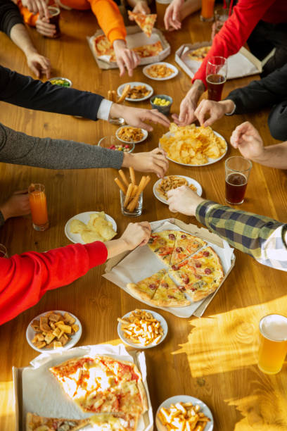 istock Happy co-workers celebrating while company party and corporate event 1191707972