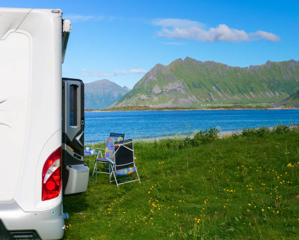 istock Camper car on beach, Lofoten islands, Norway 1191709922
