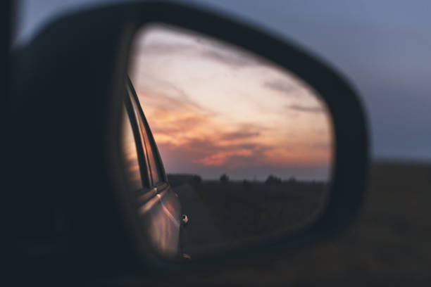 istock Side mirror of a car in sunset 1191712544
