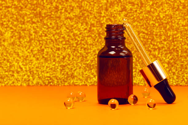 istock Face serum and vitamin capsules 1191717074
