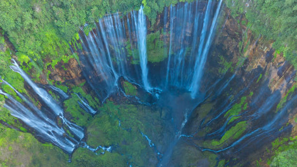 istock Tumpak Sewu Waterfall ,Lumajang, Java, Indonesia. Beautiful natural scenery. Aerial view and top view. 1191721433