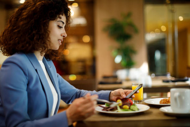 istock Businesswoman in restaurant 1191721616