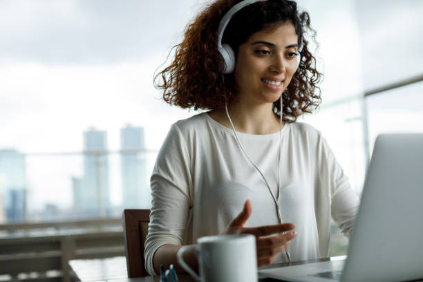 istock Young woman working on laptop 1191721844