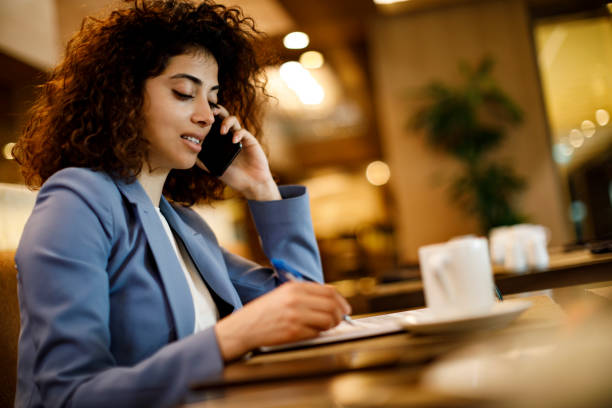 istock Businesswoman working at a cafe 1191722874